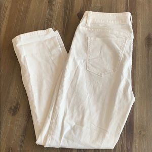 WHBM White denim pants with distressed blue denim.